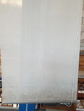 Roller blind before cleaning